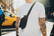 Crescent AWARE™ RPET halve maan sling bag