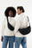 Crescent XL AWARE™ RPET halve maan sling bag