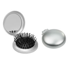 Hairbrush with mirror